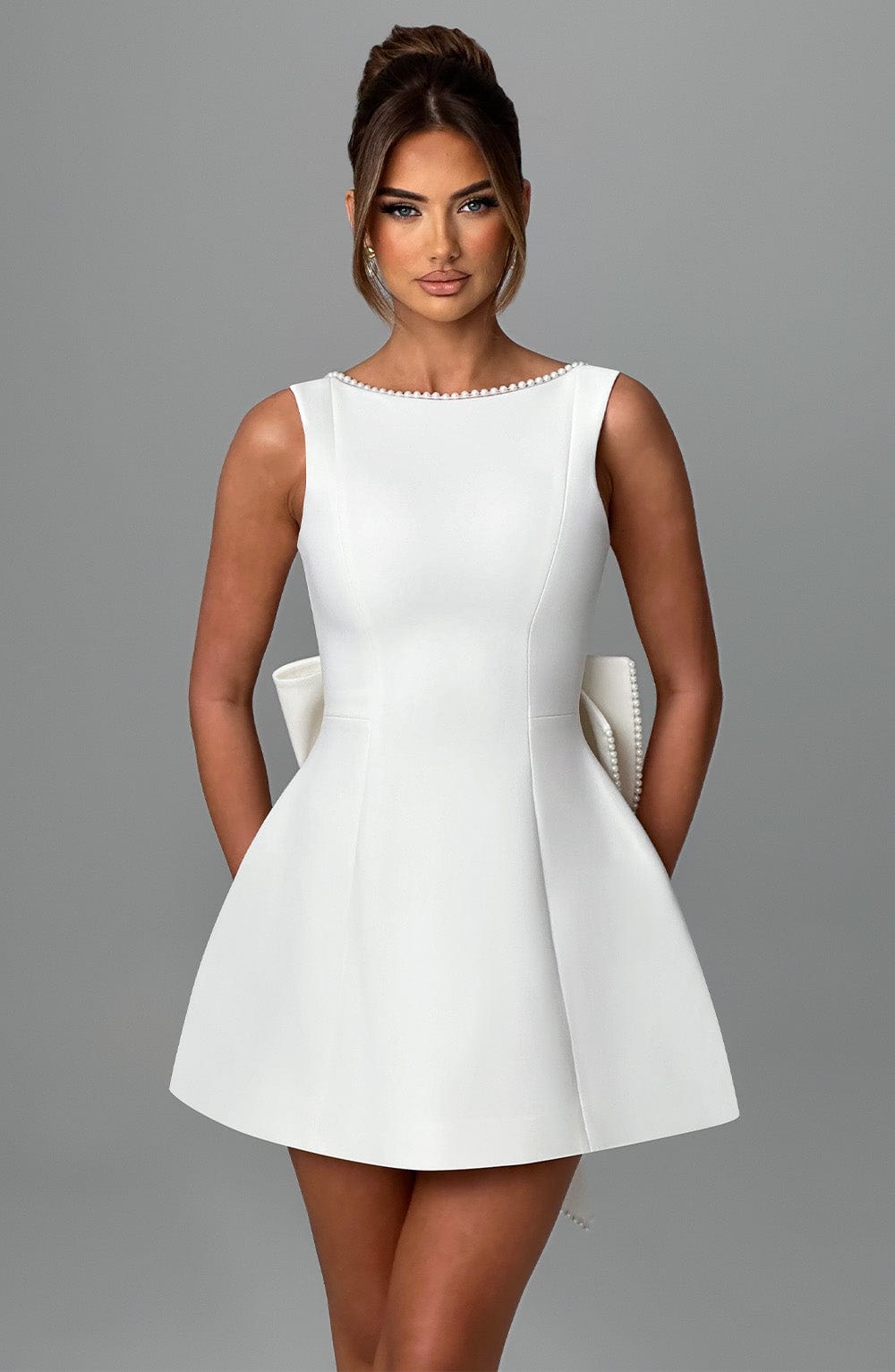 Hollis - Elegant Pearl Bow Mini Dress